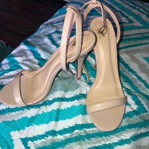 Nude open toed heels